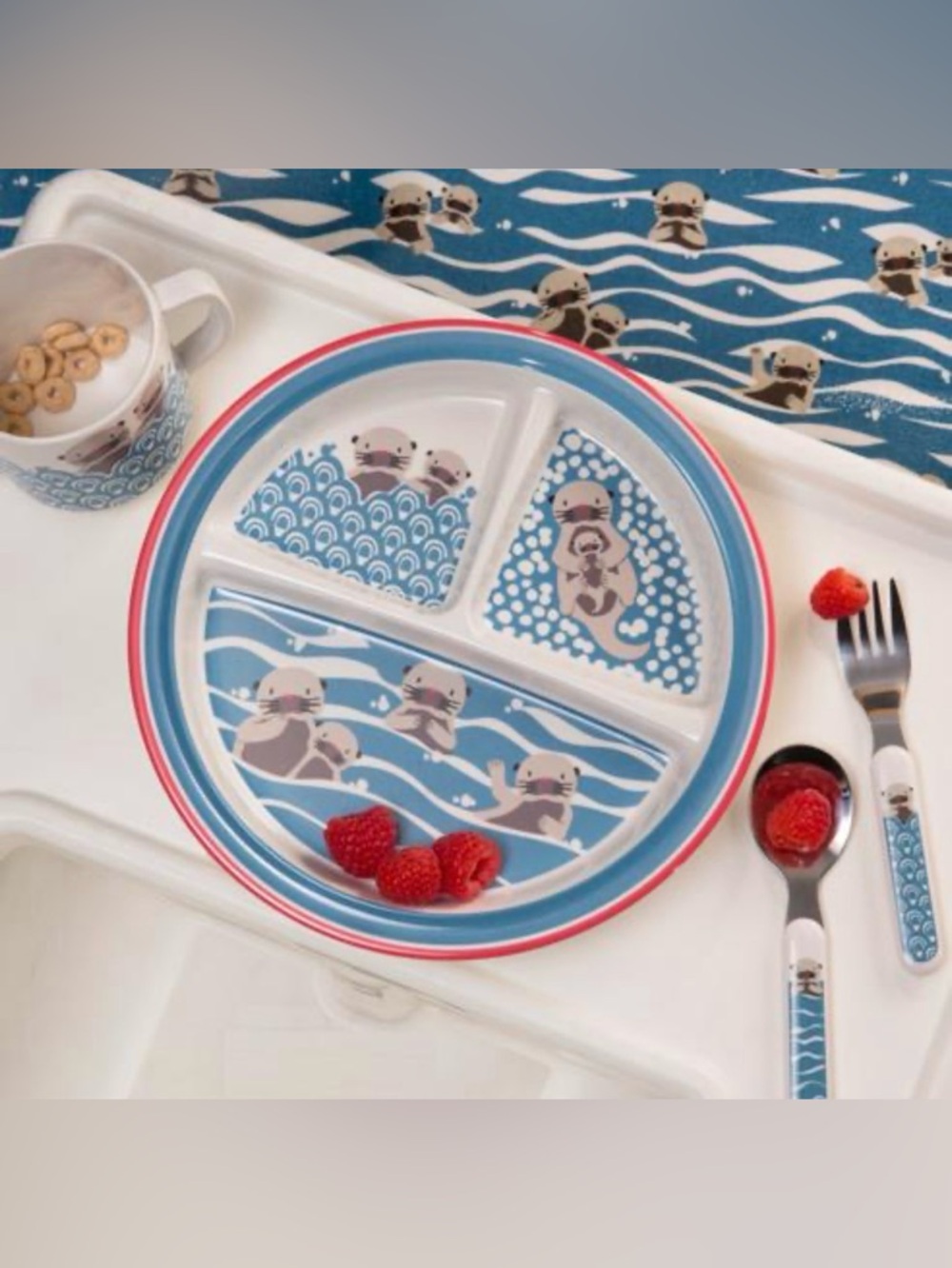 Baby sea otter divided plate and matching bib, silverware, and sippy cup.
